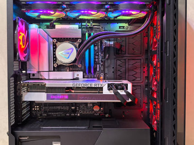 Inside view of a high-performance gaming PC showcasing components and vibrant RGB lighting.