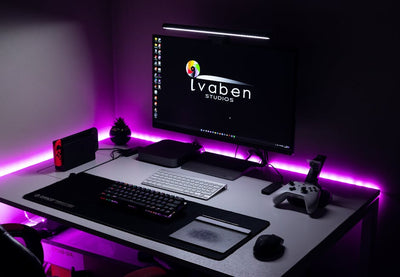 A stylish gaming area featuring LED lighting, gaming console, and modern peripherals.