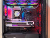 Inside view of a high-performance gaming PC showcasing components and vibrant RGB lighting.