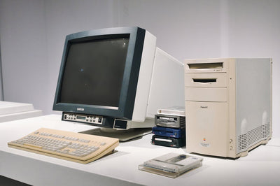A retro computer setup featuring a classic CRT monitor and vintage CPU, showcasing technology history.