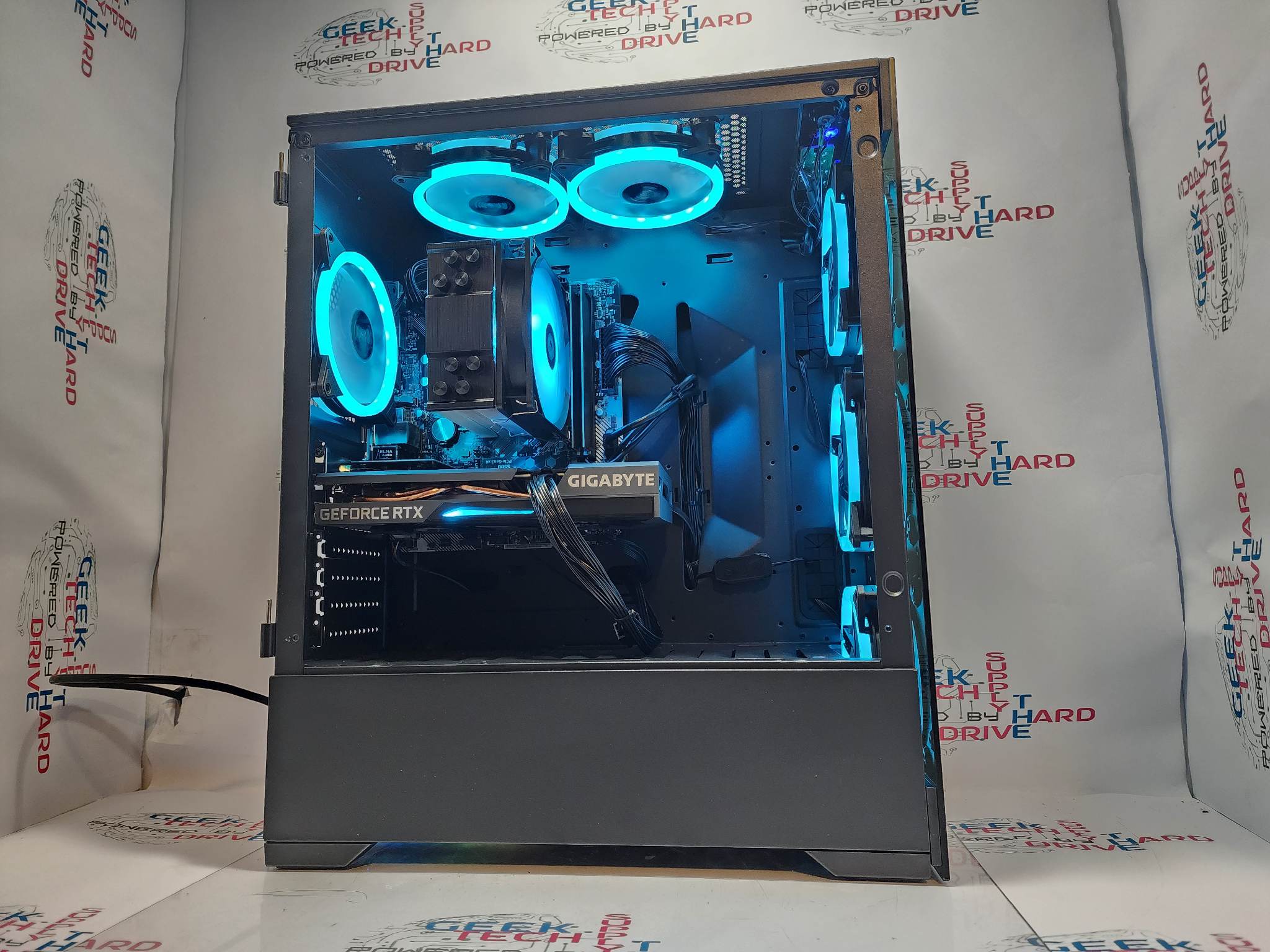 Custom Gaming PC Desktop Computer Ryzen 7 7800X3D 2TB SSD 64GB DDR5 RTX 5060 Black Vog A620M - Geek Tech